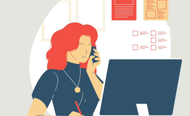 Female grant writer sitting at her desk, facing her computer while making a phone call and getting prepared to write something down about missing a grant deadline.